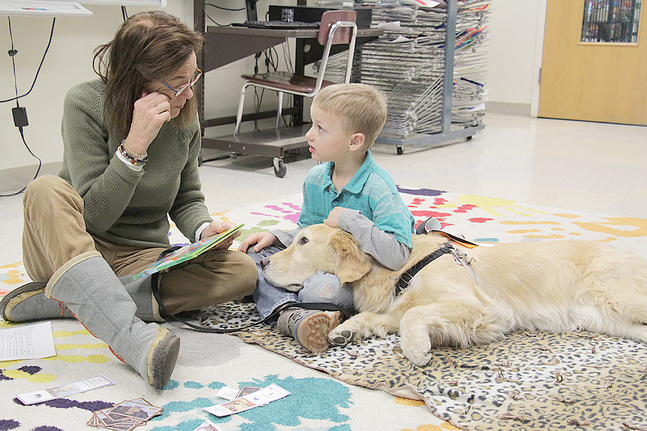 Helping hounds: dogs aid reading skills